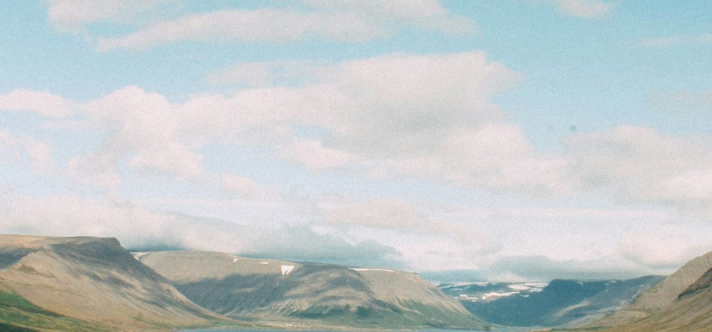 Green mountains above a fjord, Westfjords