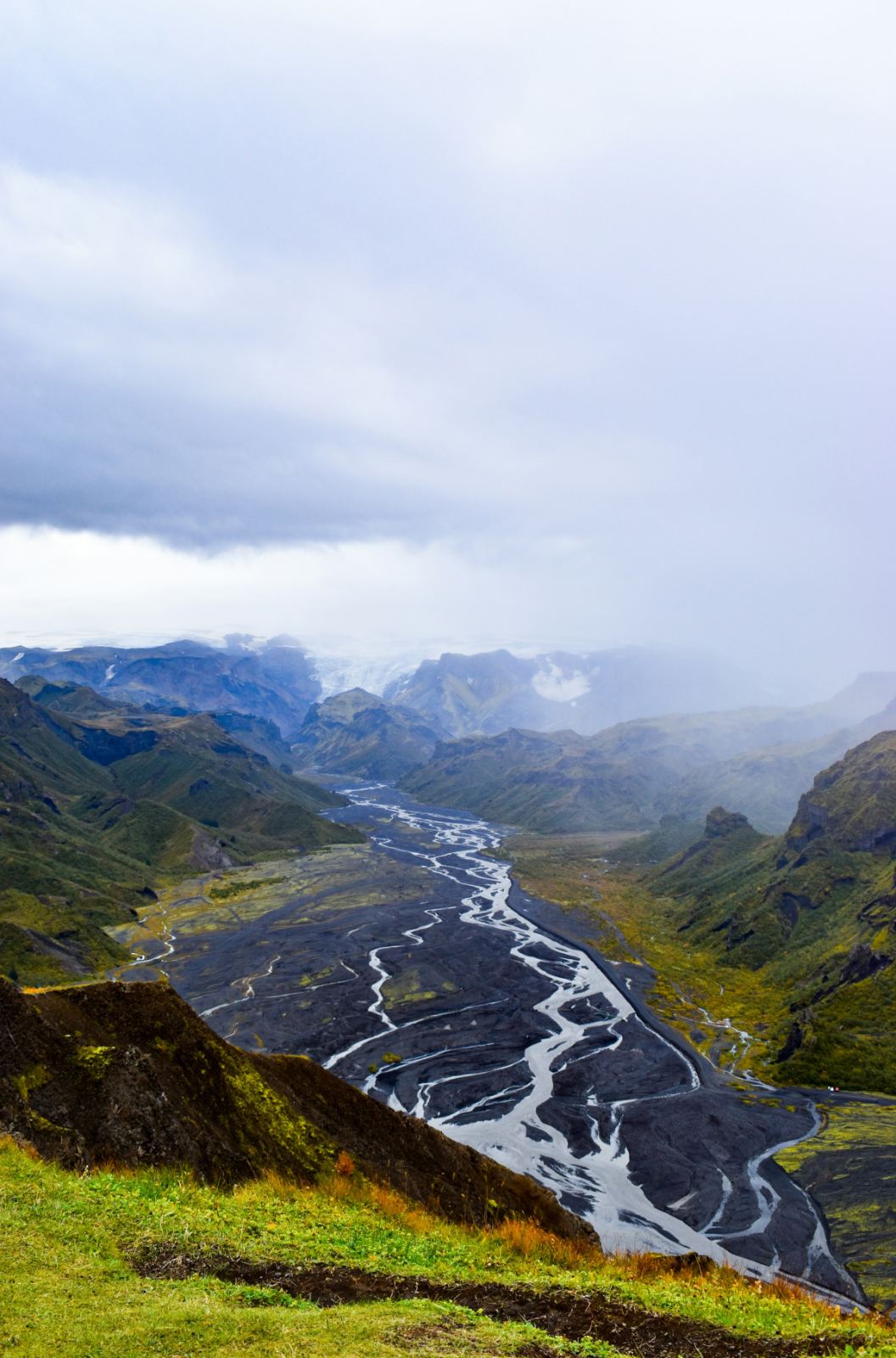 A river through the valley at Þórsmörk · Lien Van Win